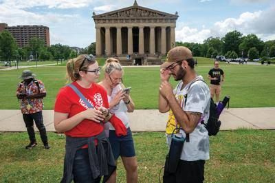 A group of Pokémon Go players gathered at Centennial Park in Nashville for a mobile game raid event.