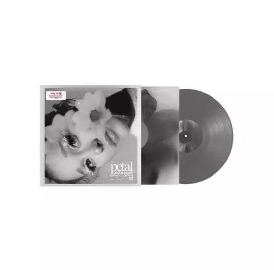 A close-up of the target exclusive vinyl edition of Ariana Grande's new studio album titled Petal.