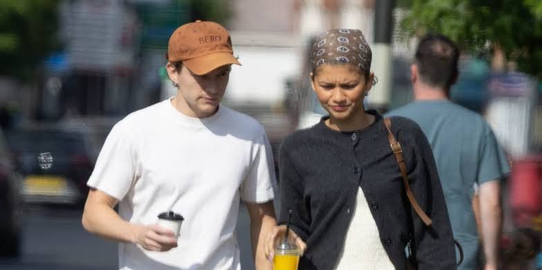 Zendaya and Tom Holland walking through London during a casual day off in July 2026.
