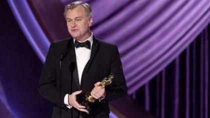 Christopher Nolan appearing on stage at the 2024 Academy Awards during the ceremony.