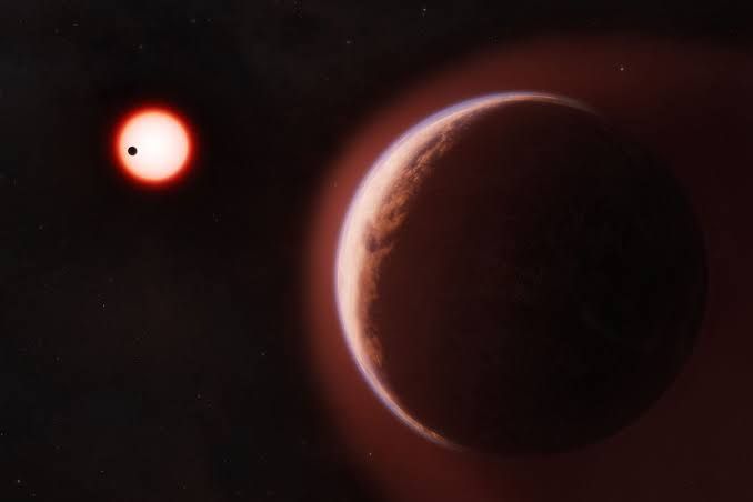 Artist illustration of exoplanet LHS 1140 b with a helium-rich atmosphere orbiting a distant red dwarf star.