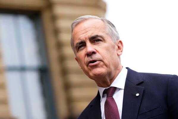 Prime Minister Mark Carney speaks to journalists in Ottawa about trade talks following new U.S. tariff announcements.