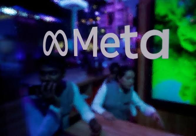 Meta branding display at a corporate conference in Mumbai during 2023.