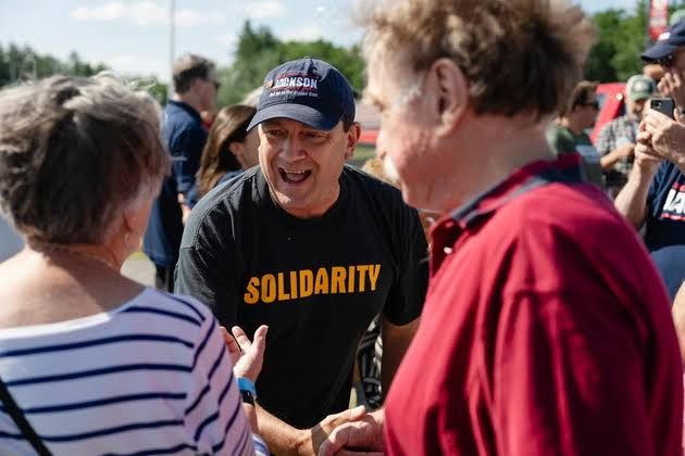Troy Jackson speaking to supporters at a campaign event in Sanford, Maine, during the delegate selection process.