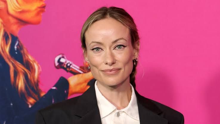 Olivia Wilde standing at the premiere of her film I Want Your Sex at the DGA Theater Complex in Los Angeles.