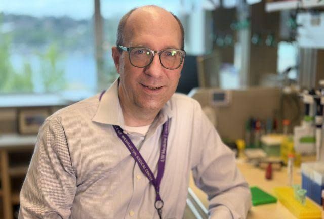 Dr. Colin Pritchard working in the cancer molecular diagnostics research lab at UW Medicine.