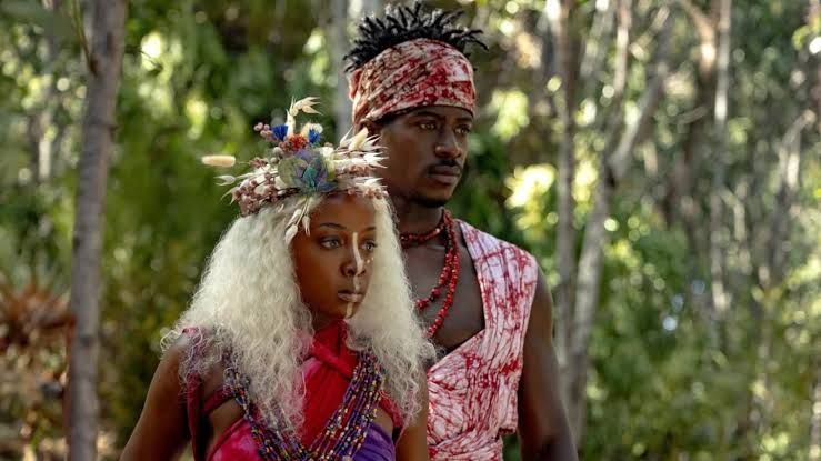 Thuso Mbedu as Zélie with white hair in the fantasy film Children of Blood and Bone.