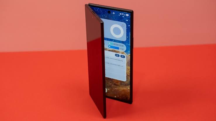 Samsung Galaxy Z Fold 8 Ultra being held in a hand to demonstrate its unfolded 8-inch display and slim hinge design.
