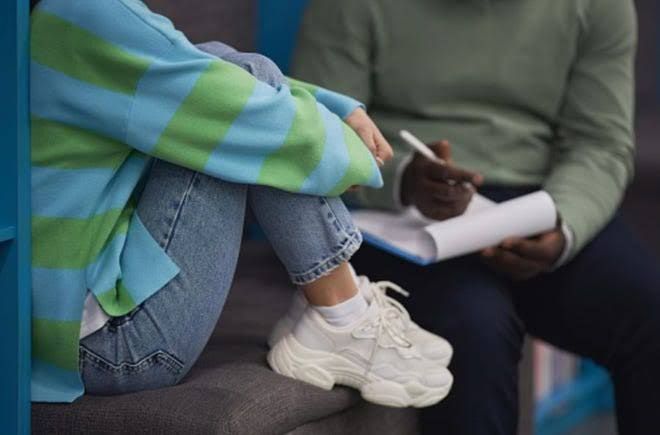 Students sitting in a classroom environment during a school day.