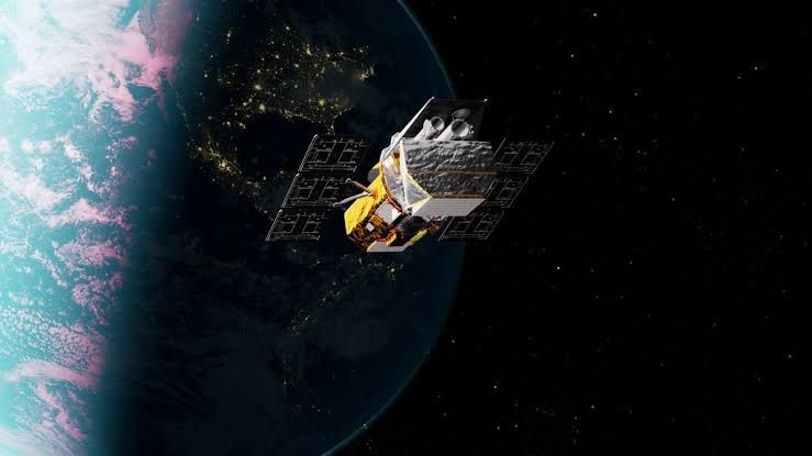 A conceptual rendering of the LINK spacecraft approaching the Swift telescope in orbit before the mission cancellation.