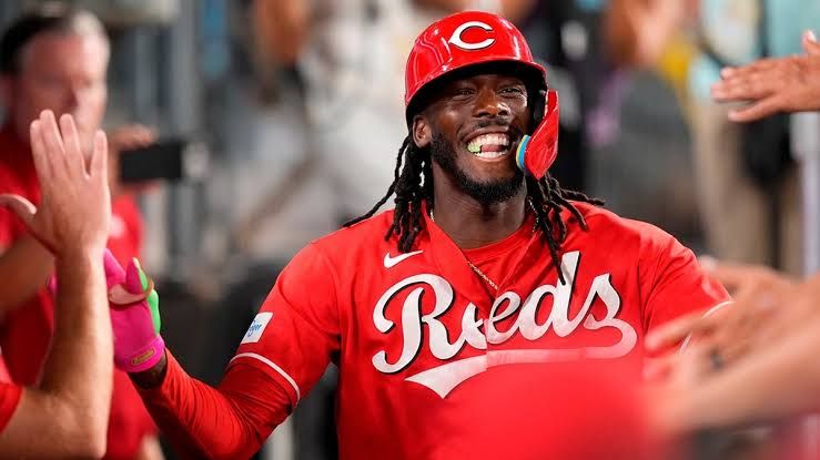 Cincinnati Reds shortstop Elly De La Cruz signaling to teammates after a two-run home run at Dodger Stadium.