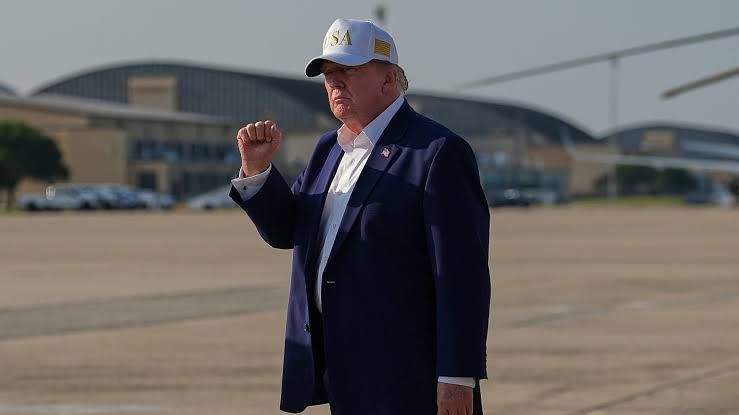 US President Donald Trump walking from Air Force One at Joint Base Andrews on August 9, 2026.