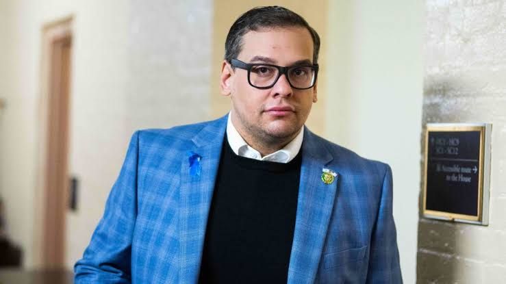 George Santos wearing a suit jacket during his time as a member of the House of Representatives.