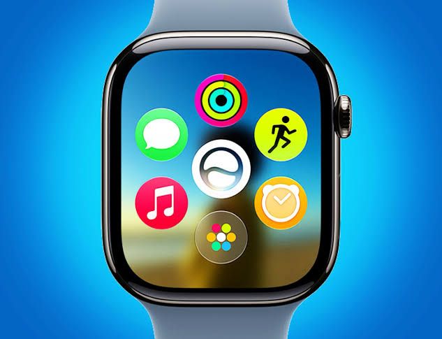 Apple Watch screen showing the new watchOS 27 home screen layout with the Siri AI app icon in the center.