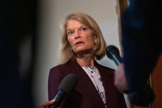 Senator Lisa Murkowski standing on Capitol Hill after announcing her opposition to attorney general nominee Todd Blanche.