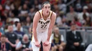 Caitlin Clark grimaces while holding her neck following contact during an Indiana Fever basketball game.