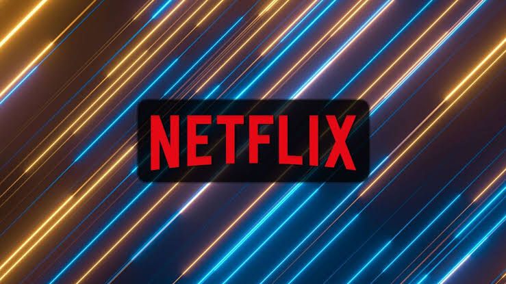 A graphic showing the Netflix logo alongside film reels and movie titles, highlighting the September 2026 additions.
