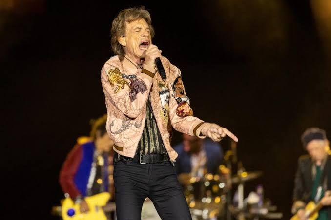 Mick Jagger, Ronnie Wood, and Keith Richards performing on stage during the Rolling Stones No Filter Tour in 2021.