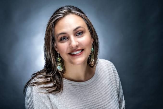 Portrait of LeMoyne Arts Executive Director Arielle Raff taken by photographer Bob O'Lary.