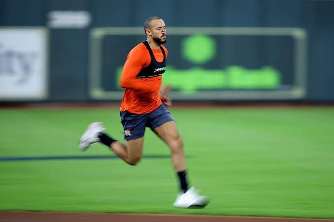 Carlos Correa running during a practice session at the Astros spring training complex in Florida.