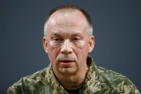 Protesters gather outside the presidential office in Kyiv demanding the removal of army chief Oleksandr Syrskyi.