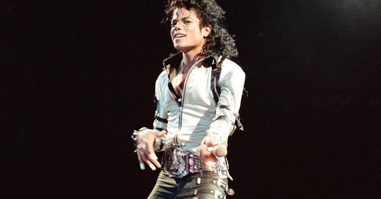 Prince Jackson standing in a theater crowd in Las Vegas at a Michael Jackson show.