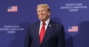 Donald Trump speaking at a podium while representatives from Trump Media & Technology Group discuss new data initiatives.