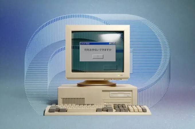 Researchers testing early computer systems at the Microcomputer Show 1980 in Japan.