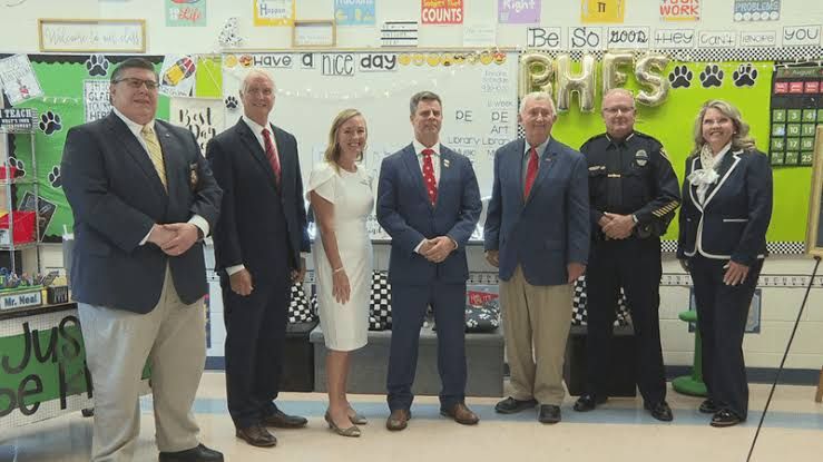 Del. Wendell Walker and law enforcement leaders speak at an event about child online safety at Bedford Hills Elementary.