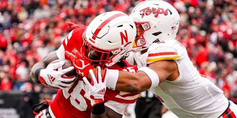 Football players during a training session at the Nebraska practice facility, illustrating the 2026 team roster composition.