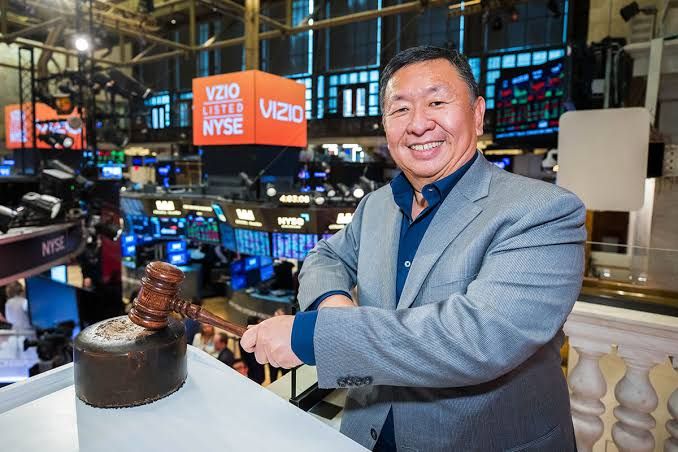 William Wang at the New York Stock Exchange ringing the closing bell to celebrate his 2023 Emmy Award.