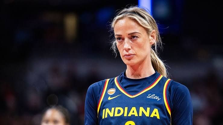 Indiana Fever guard Sophie Cunningham wearing her team jersey while playing a basketball game.