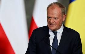 Polish Prime Minister Donald Tusk speaking at a news conference regarding the thwarted assassination plot in Warsaw.