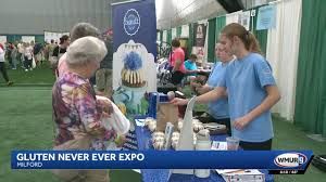 Organizer Jody Donohue speaks at the Gluten Never Ever expo held at the Hampshire Dome in Milford, New Hampshire.