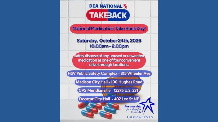 A secure disposal bin for prescription drugs situated in a local community center during a take-back event.