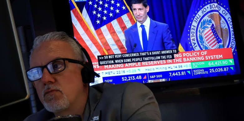 Federal Reserve Chairman Kevin Warsh giving a press conference at the Fed headquarters.