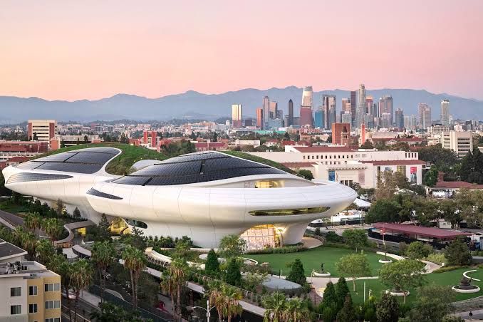 The futuristic, curved Lucas Museum of Narrative Art stands beside the USC campus in Los Angeles.