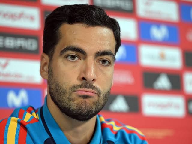 Mikel Merino speaking at a press conference at the training grounds ahead of the 2026 World Cup final.