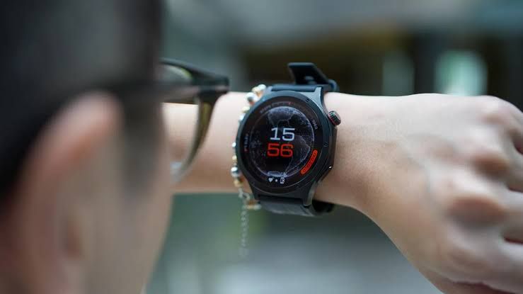 The OPPO Watch X3 smartwatch with a titanium case and sleek bezel displayed on a neutral surface.