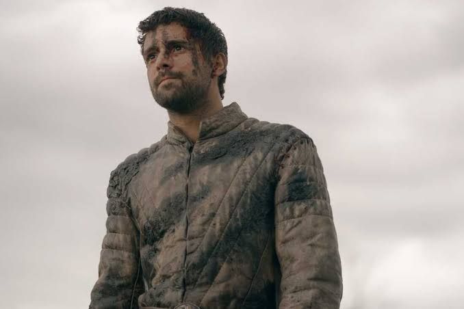 Fabien Frankel as Ser Criston Cole looking defeated on a battlefield in House of the Dragon.