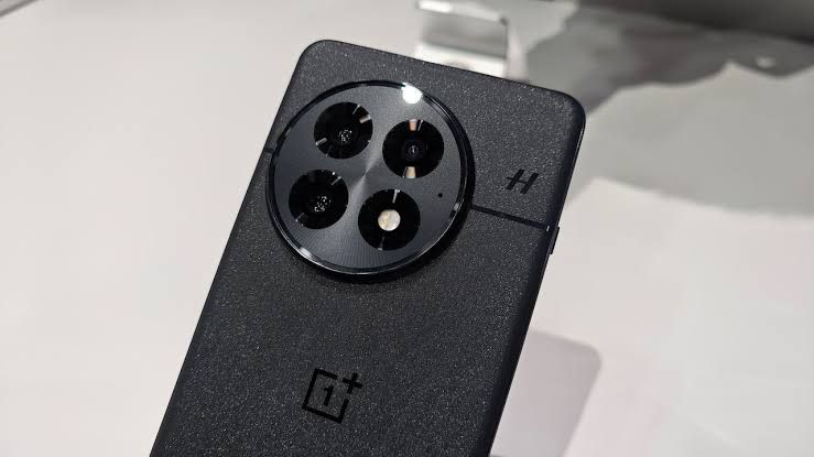 A close-up view of the Fairphone modular smartphone showing the internal components and user-replaceable battery pack.