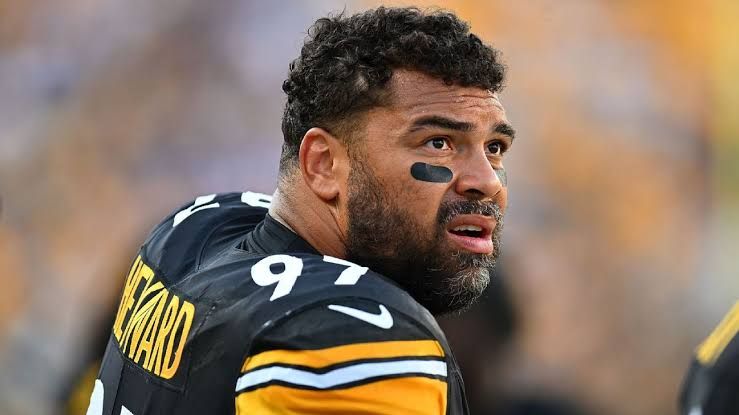 Cameron Heyward speaking during a press conference while wearing a Pittsburgh Steelers uniform.