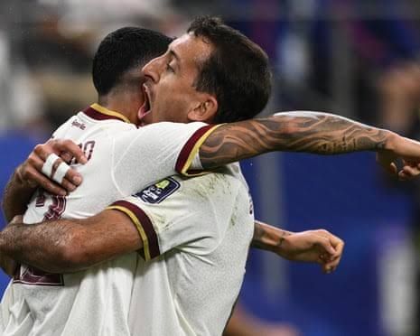 Pedro Porro and Mikel Oyarzabal celebrate a goal during the Spain vs France World Cup semi-final match.