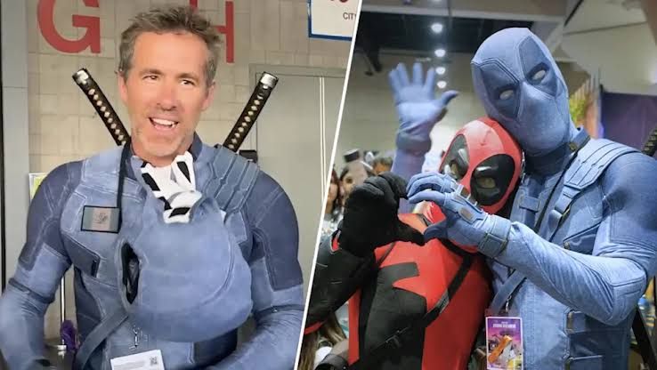 Ryan Reynolds in full Deadpool costume walking among fans at the San Diego Convention Center.