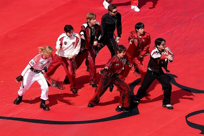 BTS members performing during the 2026 FIFA World Cup final in East Rutherford.