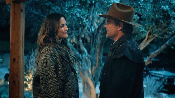 Josh Duhamel as Staten Kirkland and Minka Kelly as Quinn O'Grady standing together on the Double K Ranch set.