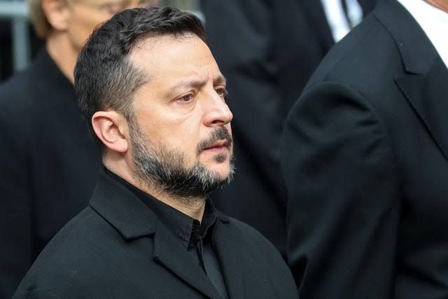 President Volodymyr Zelenskyy walks in a funeral procession in Oslo for the late King Harald V.