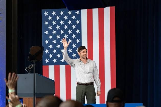 Senator Jon Ossoff speaking at an Atlanta campaign rally to supporters.
