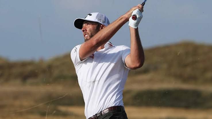 Sam Burns walks on the fairway after his birdie putt at the 14th hole during the third round of The Open.