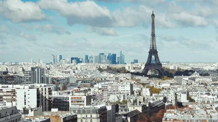 Panoramic view of the Eiffel Tower in Paris, France during the daytime.